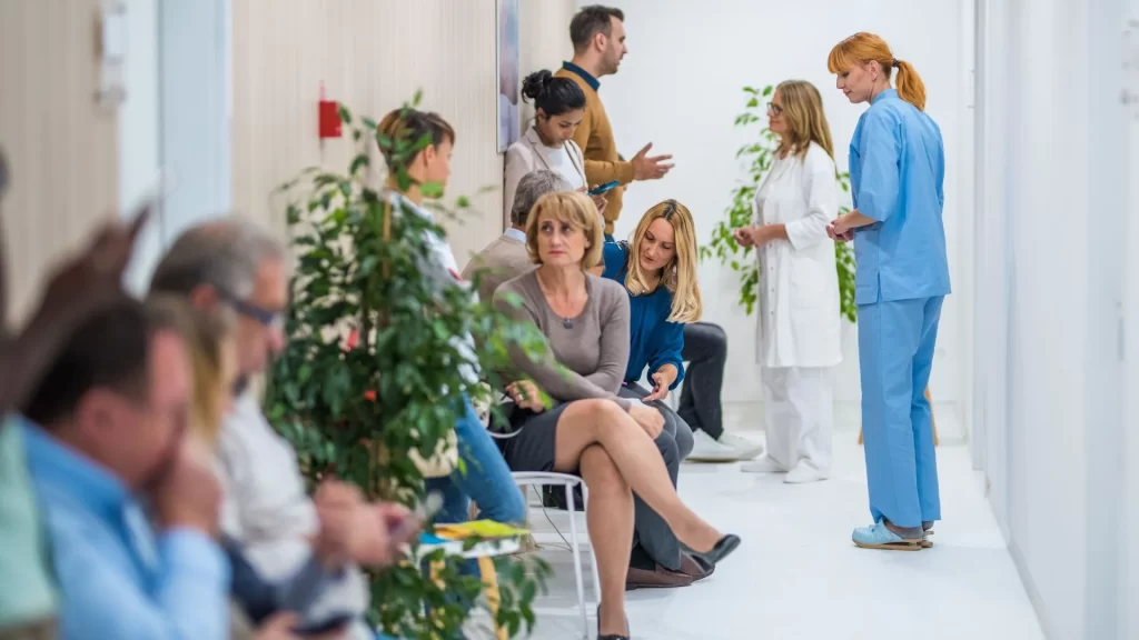 A busy queue of waiting patients in a medical office